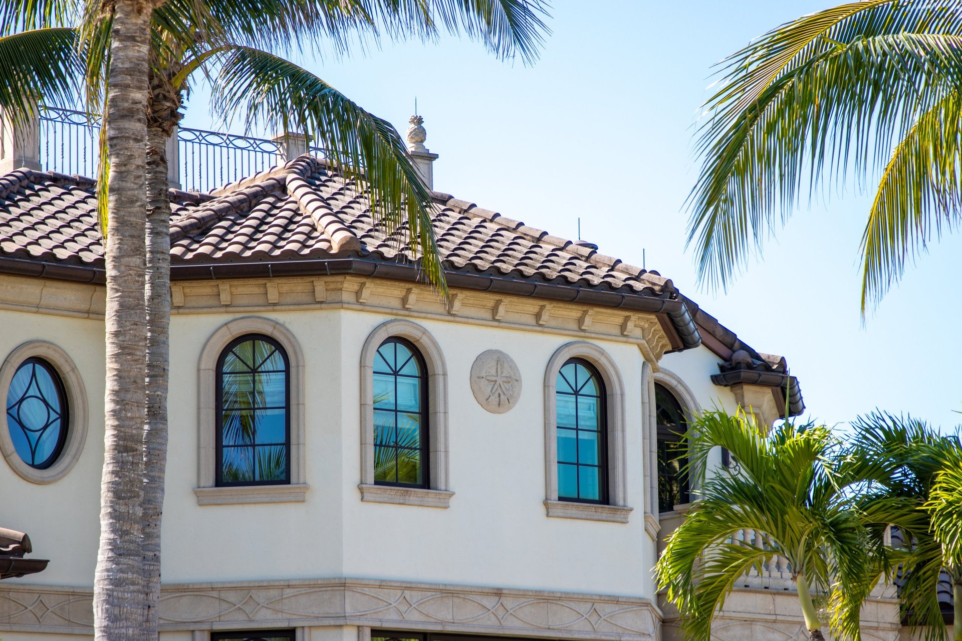 Spanish style property with palm trees
